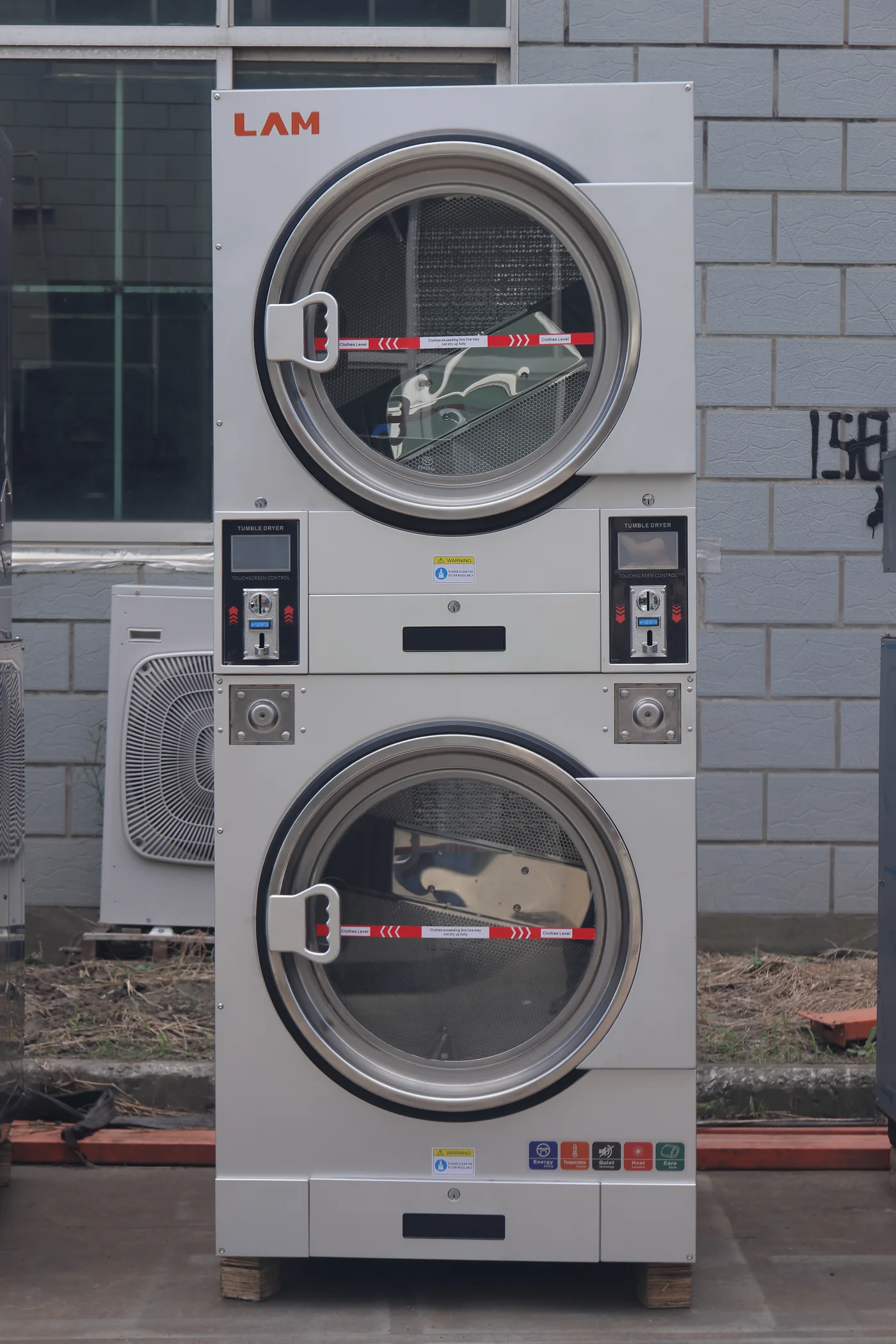 Space-saving stacked Laundry Aide dryer