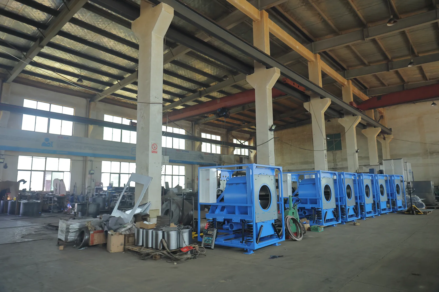 Laundry Aide manufacturing workshop with equipment frames